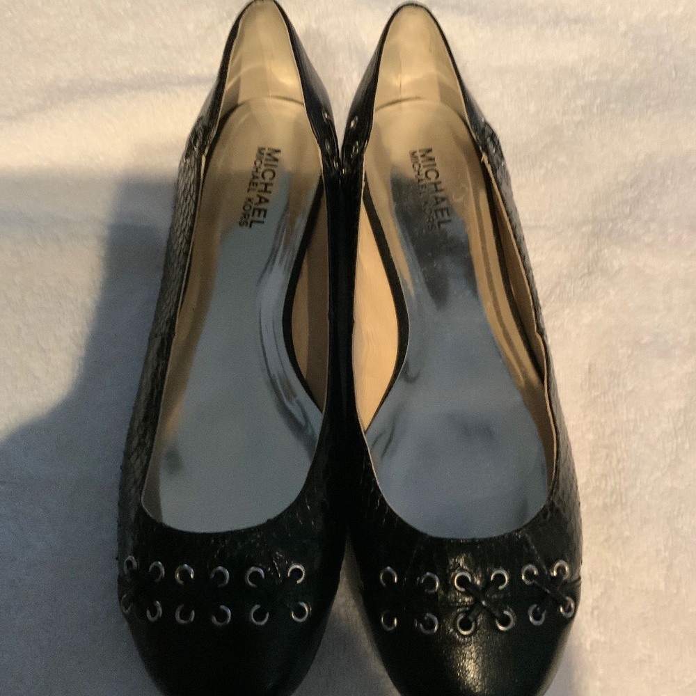 Black snake and smooth leather Michael Kors flats with yellow eyelets